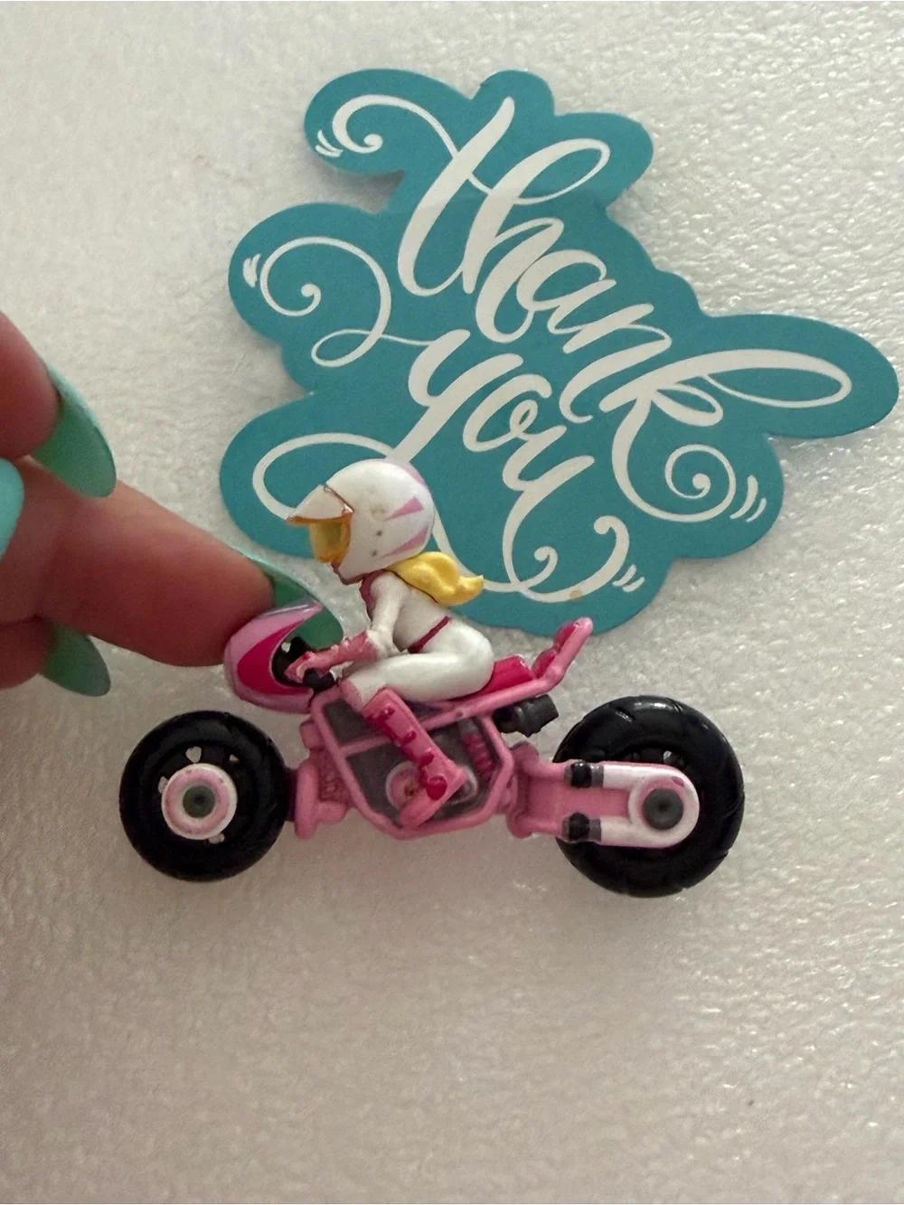 The Hot Wheels Mario Kart 4 Pack Super Mario Bros Movie featuring Princess Peach
